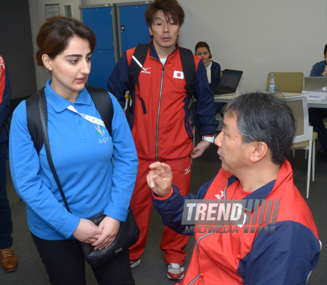 Делегации различных стран проходят аккредитацию на Кубок мира по прыжкам на батуте в Баку. Азербайджан, 3 март, 2016 